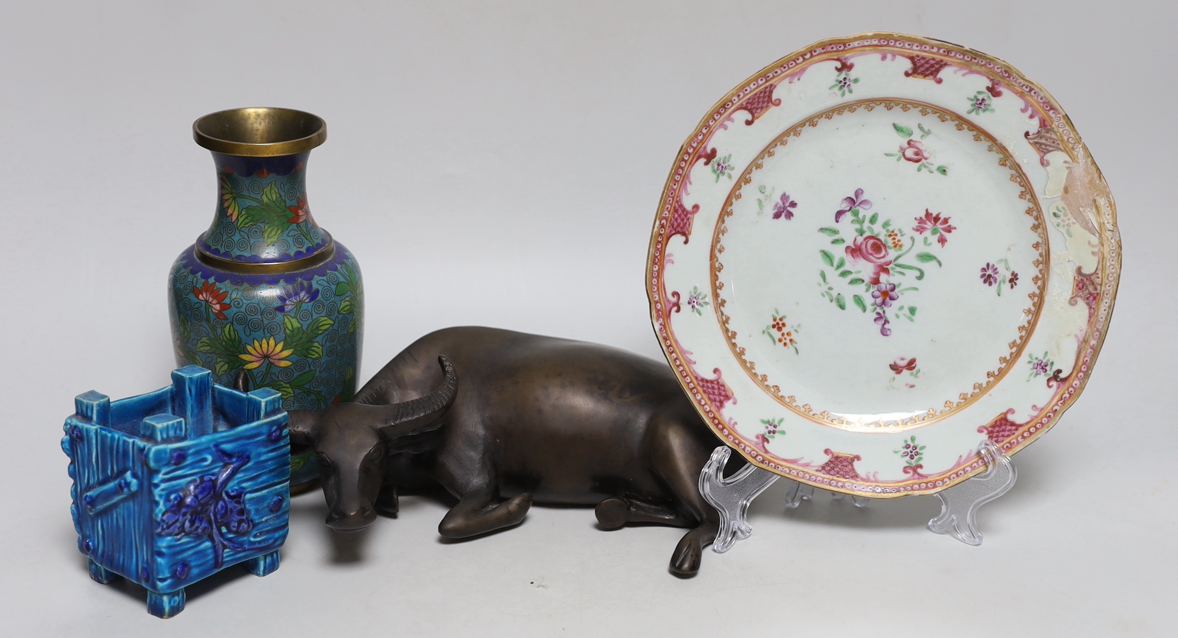 A model of a Chinese bronze bull, a cloisonné enamel vase, a export plate and a Japanese pottery vessel, tallest 17cm high